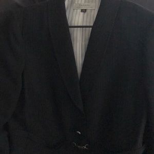 A black Tahari interview suit.